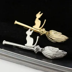 Metal hair clip - cat on broomstick