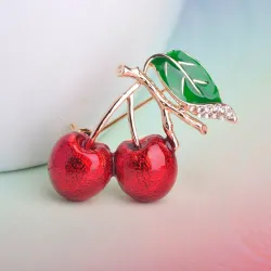 BrochesElegant brooch with red crystal cherry