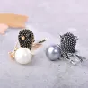 Vintage bird-shaped brooch with pearl