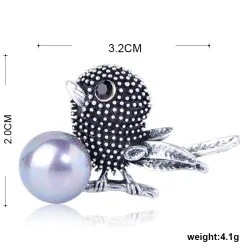 Vintage Brosche in Vogelform mit Perle