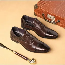 Elegante leren platte schoenen - slangenleer patroon - met vetersSchoenen