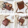 Uggleformad liten läderväska - crossbody / axel
