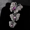 Vintage broche met driedubbele kristallen vlindersBroches