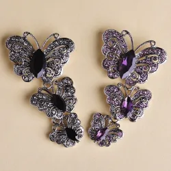 Vintage broche met driedubbele kristallen vlindersBroches