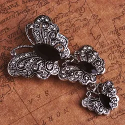 Vintage broche met driedubbele kristallen vlindersBroches