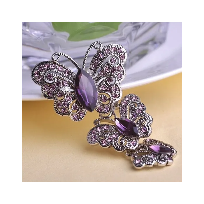 Vintage broche met driedubbele kristallen vlindersBroches
