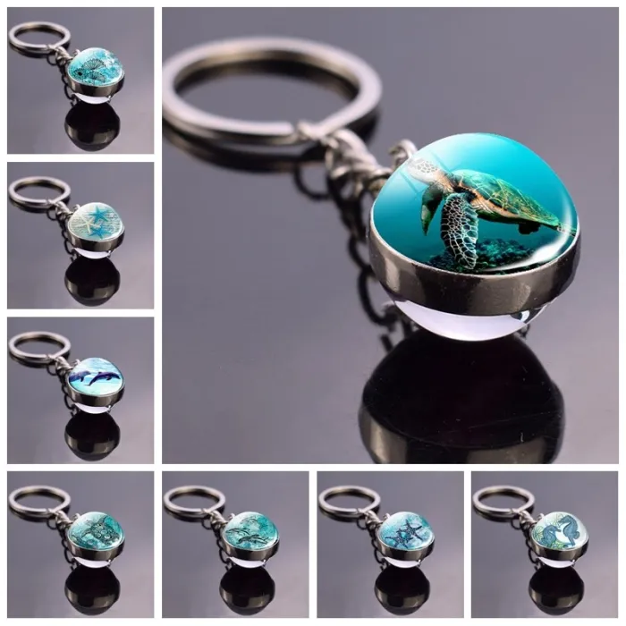 llaveroBlue sea life - round double sided glass keychain - turtle / dolphin / seashells