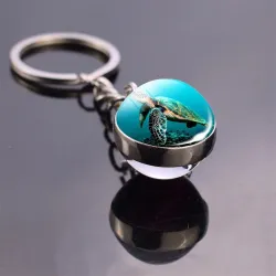 llaveroBlue sea life - round double sided glass keychain - turtle / dolphin / seashells