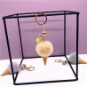 Metal keychain - with a fluffy ice cream pendant