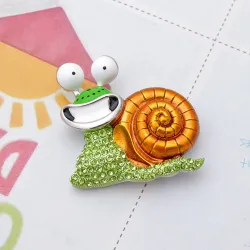 Lachende kristallen slak - brocheBroches