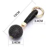 llaveroCrystal ball - keychain with leather strap