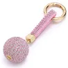 llaveroCrystal ball - keychain with leather strap