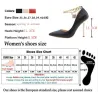 Elegant high heel pumps - with a metal ankle chain