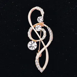 Luxurious gold brooch - with crystal music note