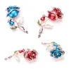 Luxe broche met dubbele kristallen roosBroches