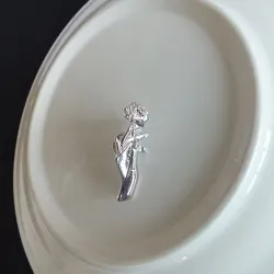Silver brooch with a hand holding rose - pin