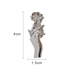 Silver brooch with a hand holding rose - pin
