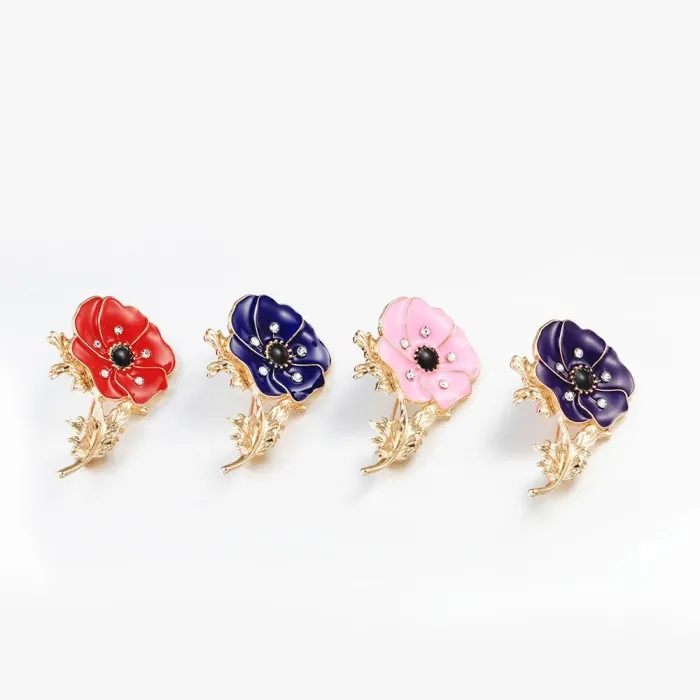 Kleine emaille bloem met kristallen - vintage brocheBroches