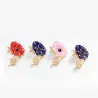 Kleine emaille bloem met kristallen - vintage brocheBroches