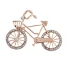 Kristallen broche in de vorm van een fietsBroches