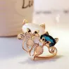 Broche met twee kristallen vossenBroches
