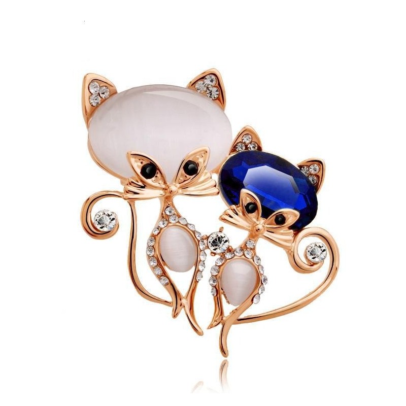 Brooch with two crystal foxes