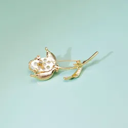 Elegante Brosche mit Opal / Kristalltulpe