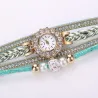 Mehrschichtiges Armband mit runder Uhr - Kristalle / Perlen