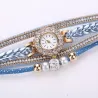 Mehrschichtiges Armband mit runder Uhr - Kristalle / Perlen