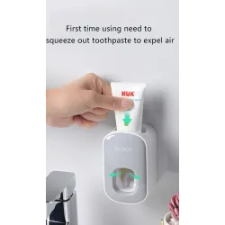 Automatic toothpaste dispenser - wall mounted