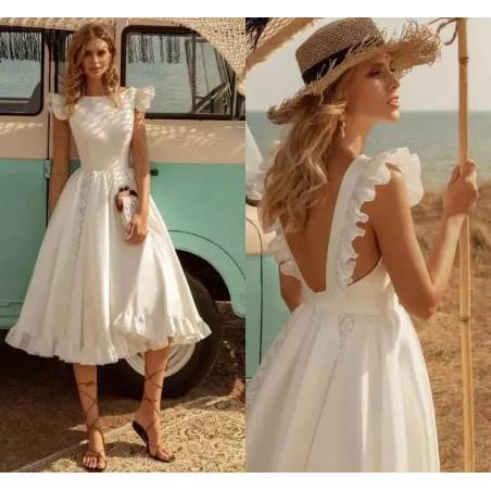 VestidosVestido blanco satinado - largo hasta la rodilla - sin mangas - espalda abierta - con volantes