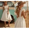 VestidosVestido blanco satinado - largo hasta la rodilla - sin mangas - espalda abierta - con volantes