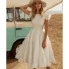VestidosVestido blanco satinado - largo hasta la rodilla - sin mangas - espalda abierta - con volantes