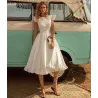 VestidosVestido blanco satinado - largo hasta la rodilla - sin mangas - espalda abierta - con volantes