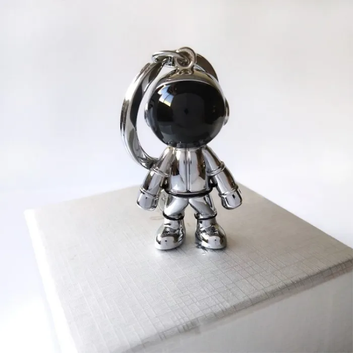 Modny ręcznie robiony brelok - z astronautą 3D - robotem kosmicznymBreloczki Do Kluczy
