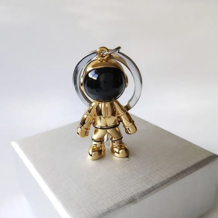 Modny ręcznie robiony brelok - z astronautą 3D - robotem kosmicznymBreloczki Do Kluczy