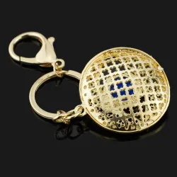 Porte-clés creux rond - avec un oeil en cristal