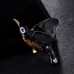 Elegante Brosche mit einem kleinen Vogel