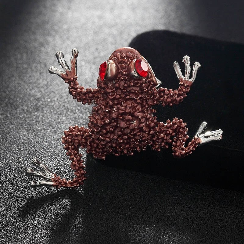 Mała kryształowa żaba z czerwonymi oczami - vintage broszkaBroszki