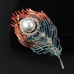 Trendige Brosche mit Feder / Perle / Kristallen
