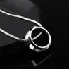 Pendentif rond tendance - avec chaîne en acier au titane - unisexe
