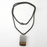 Pendentif pierre oeil de tigre noir naturel - avec chaîne - acier inoxydable