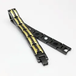 Trendigt svart/guld magnetarmband - rostfritt stål - unisex - 2 st