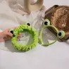 Bredskygget pandebånd - sjov frø