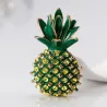 Elegant broche med grøn krystal ananas