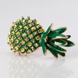 Elegant broche med grøn krystal ananas