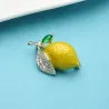 Trendig brosch med gul citron/kristaller