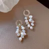 Elegante guldøreringe - med flere lag perler