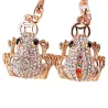 llaveroSapo de cristal con moneda antigua - llavero