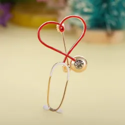 Stetoscopio a forma di cuore - con cristallo - elegante spilla
